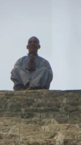 a Monk waiting for us at the top of the stairs